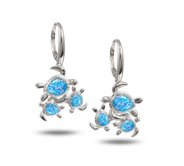 The picture shows a pair of 925 sterling silver opalite family of sea turtles earrings.