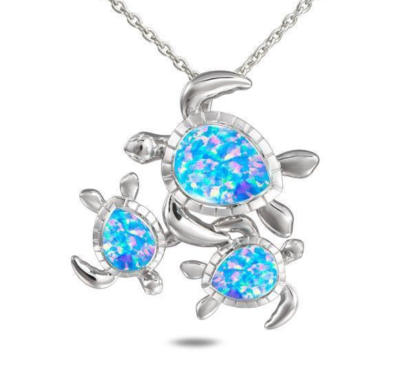 The picture shows a 925 sterling silver opalite family of three sea turtles pendant with topaz.