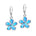 In this photo there is a pair of sterling silver plumeria earrings with blue opalite gemstones.