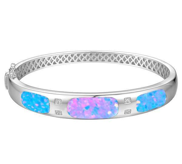 The picture shows a sterling silver opalite bangle with cubic zirconia.