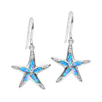 The picture shows a pair of 925 sterling silver opalite sea star earrings with topaz.