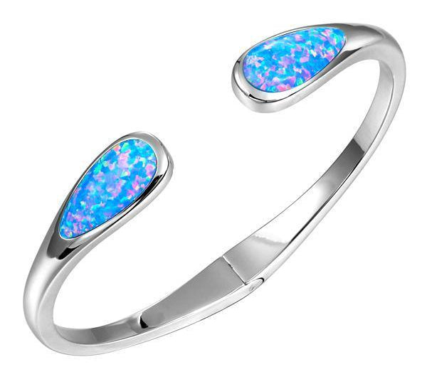 The picture shows a 925 sterling silver opalite teardrop bangle.