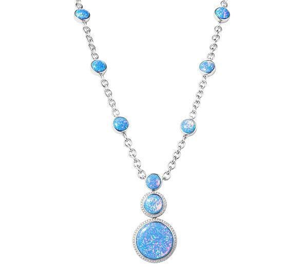 The picture shows a 925 sterling silver opalite three circles necklace and topaz.