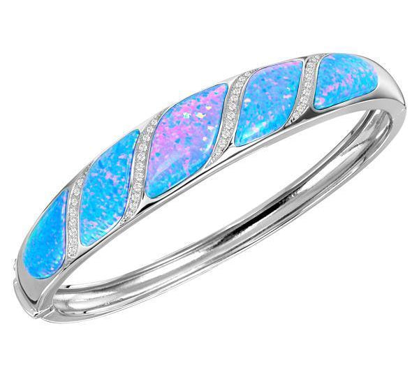 The picture shows a sterling silver opalite twist bangle with cubic zirconia.