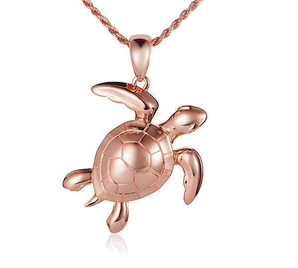 The picture shows a 14K rose gold sea turtle pendant.
