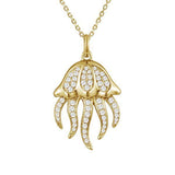 The picture shows a 925 sterling silver, yellow gold plated, pavé barrel jellyfish pendant with topaz.