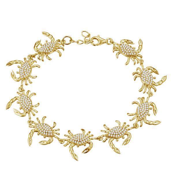 The picture shows a 925 sterling silver yellow gold plated blue crab bracelet with topaz.