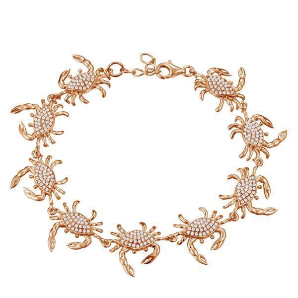 The picture shows a 925 sterling silver rose gold plated blue crab bracelet with topaz.
