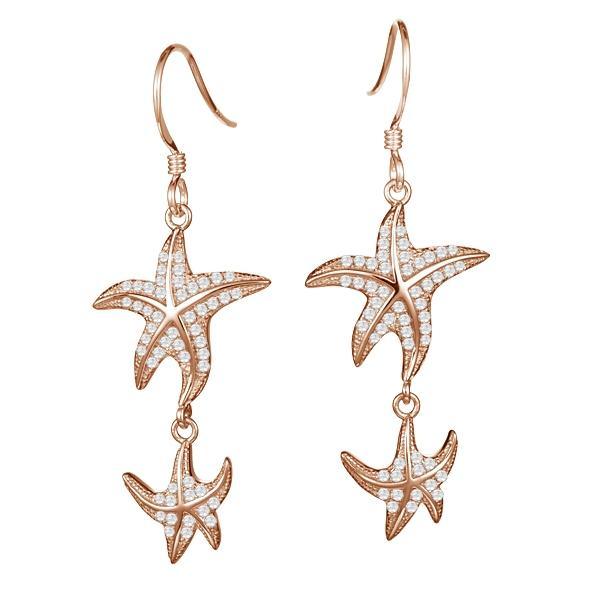 The picture shows a pair of 14K yellow gold pavé diamond starfish hook earrings.