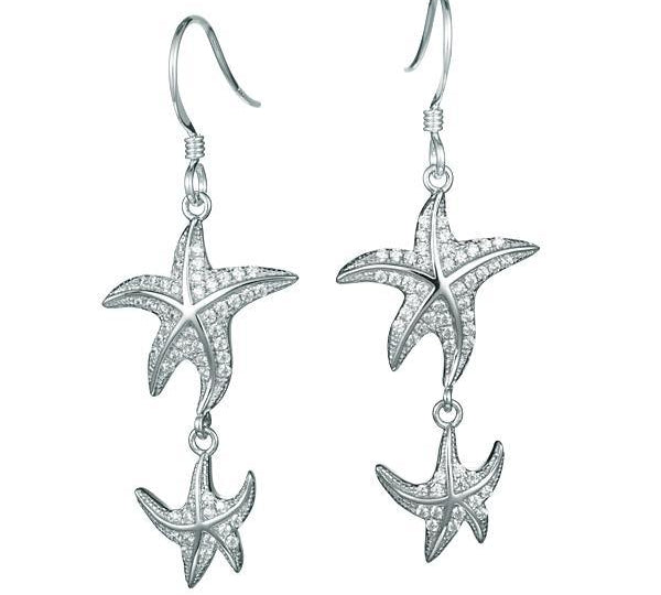 The picture shows a pair of 14K white gold pavé diamond starfish hook earrings.