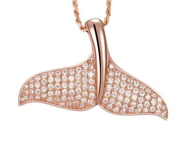 The picture shows a 14K rose gold pavé diamond whale tail pendant.