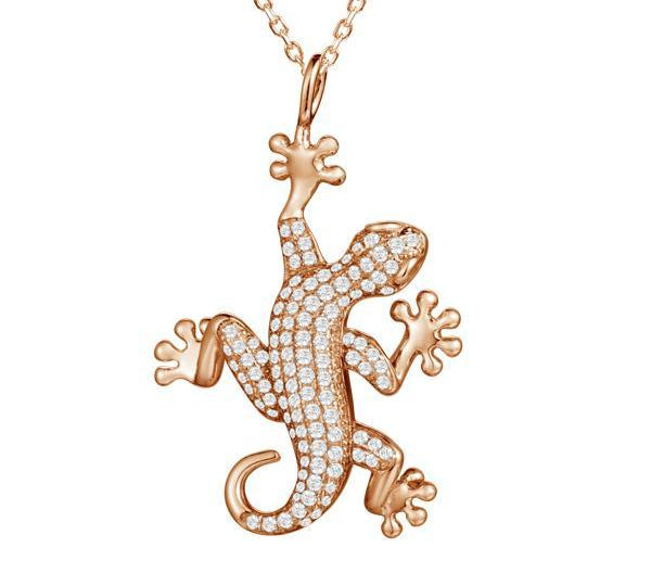 In this photo there is a rose gold vermeil gecko pendant.