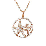 The picture shows a 925 sterling silver, rose gold vermeil, double starfish circle pendant with topaz.