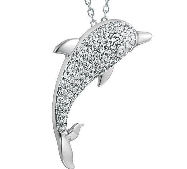 The picture shows a 925 sterling silver, white gold-vermeil, dolphin pendant with topaz.