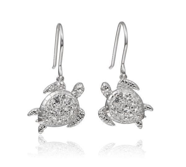 The picture shows a pair of 925 sterling silver sea turtle hook earrings with topaz.