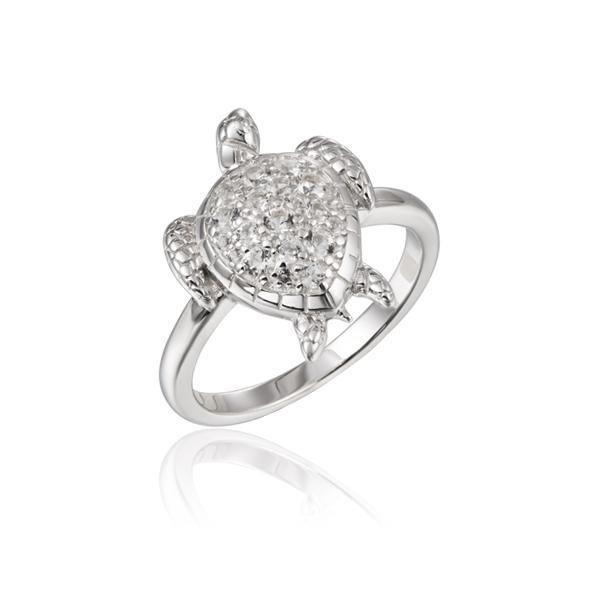 The picture shows a 925 sterling silver sea turtle ring with topaz gemstones on its shell