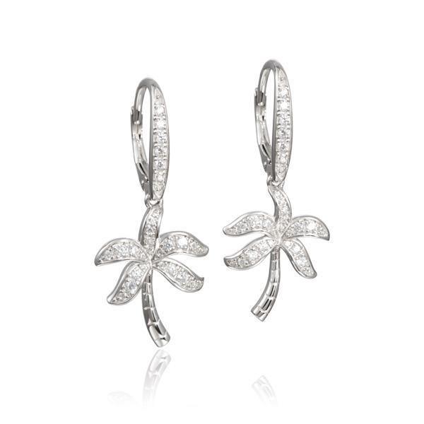 In this photo there is a pair of sterling silver palm tree earrings with topaz gemstones.