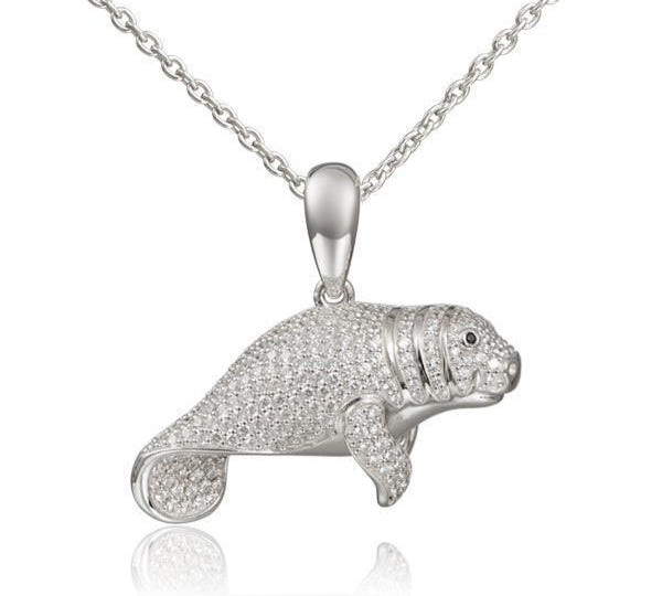 The picture shows a 925 sterling silver pavé manatee pendant with cubic zirconia.