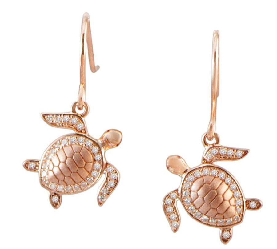The picture shows a pair of 925 sterling silver rose gold-vermeil sea turtle hook earrings with topaz.