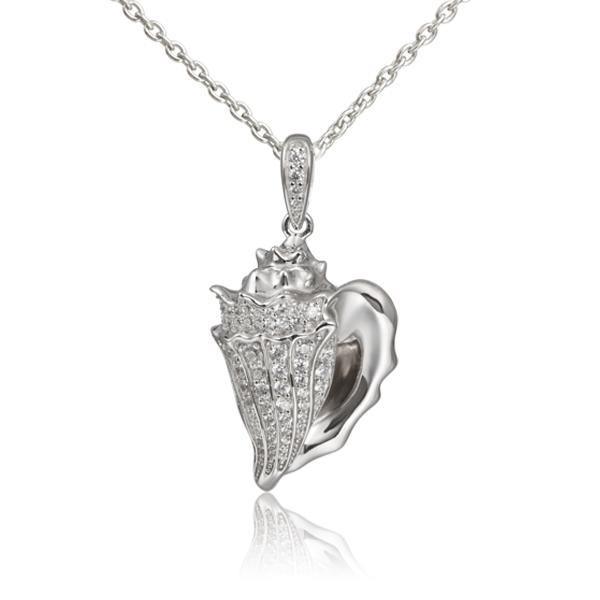 In this photo there is a sterling silver king conch shell pendant with topaz gemstones.