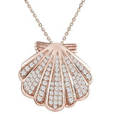 The picture shows a 925 sterling silver, rose gold-vermeil, pavé oyster shell pendant with topaz.