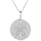 The picture shows a 14K white gold pavé sand dollar pendant with diamonds.