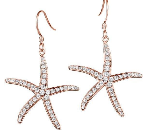 The picture shows a pair of 925 sterling silver pavé rose gold vermeil sea star hook earrings.