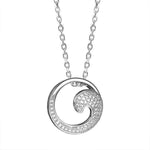 The photo is a sterling silver pavé wave pendant with topaz.