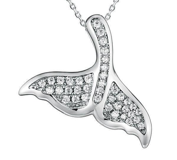 The picture shows a 925 sterling silver, white gold vermeil, pavé whale tail pendant with topaz.