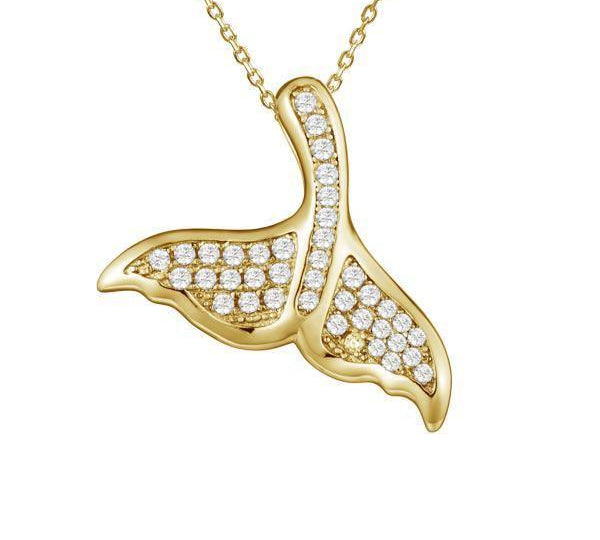 The picture shows a 925 sterling silver, yellow gold vermeil, pavé whale tail pendant with topaz.
