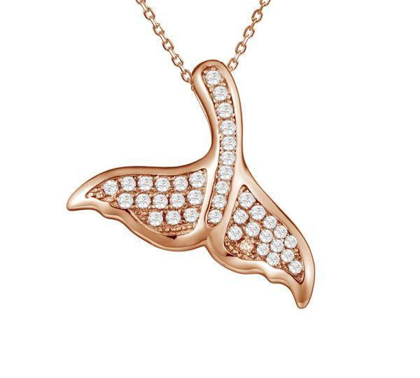 The picture shows a 925 sterling silver, rose gold vermeil, pavé whale tail pendant with topaz.