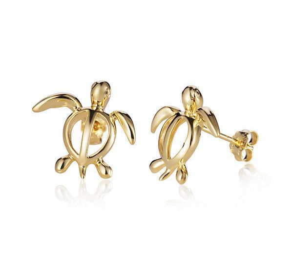 In this picture there is a pair of 14k yellow gold sea turtle stud earrings.