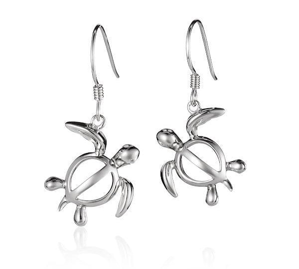 The picture shows a pair of 14K white gold sea turtle hook earrings.