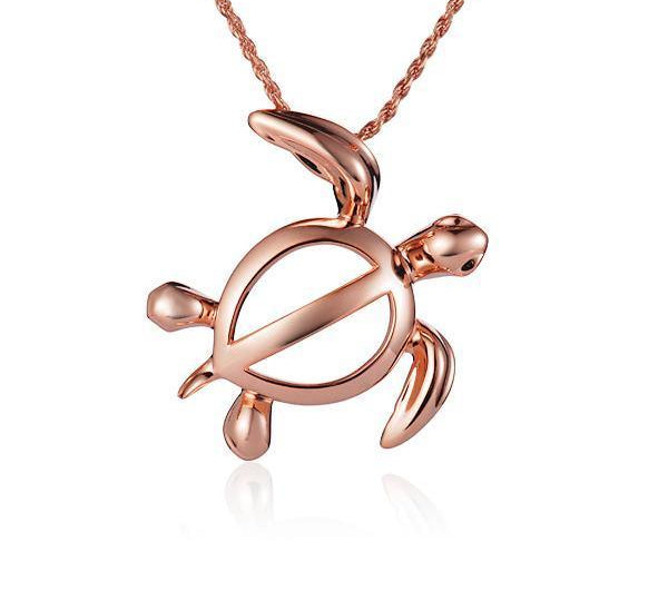 The picture shows a 14K rose gold polynesian sea turtle pendant.