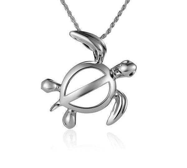 The picture shows a 14K white gold polynesian sea turtle pendant.