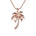 In this photo there is a rose gold queen palm tree pendant with three diamond coconuts.