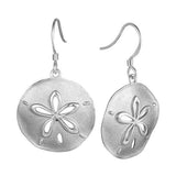 The picture shows a 14K white gold cut out sand dollar hook earrings.