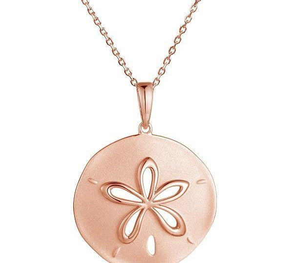 The picture shows a 14K rose gold cut out sand dollar pendant.