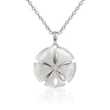 The picture shows a 925 sterling silver sand dollar pendant with topaz.