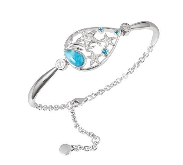 The picture shows a 925 sterling silver bracelet with three starfish, seaweed, and topaz, aquamarine, and larimar gemstones.