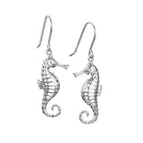 The picture shows a pair of 925 sterling silver seahorse hook earrings with topaz.
