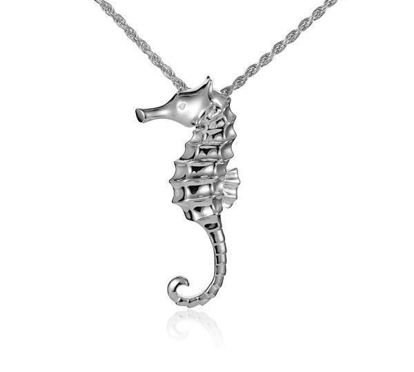 The picture shows a 14K white gold seahorse pendant with a diamond.