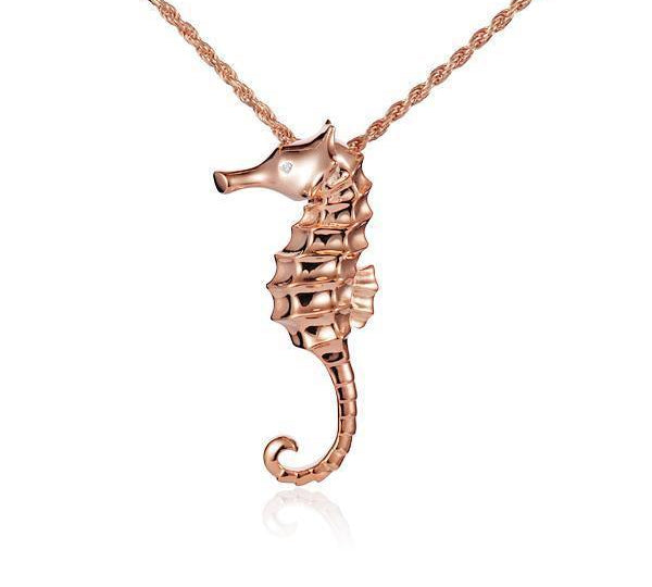 The picture shows a 14K rose gold seahorse pendant with a diamond.