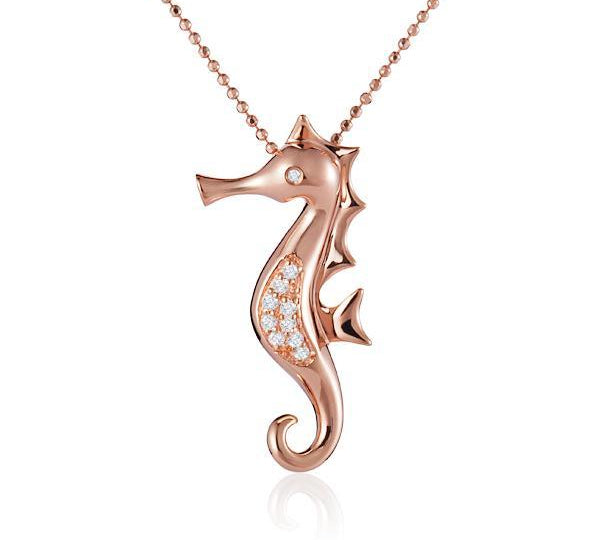 The picture shows a 14K rose gold seahorse pendant with diamonds.