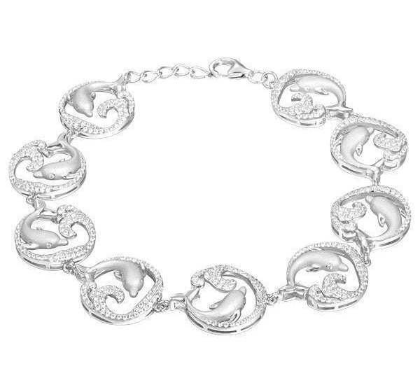 The picture shows a white gold dolphin bracelet with topaz.