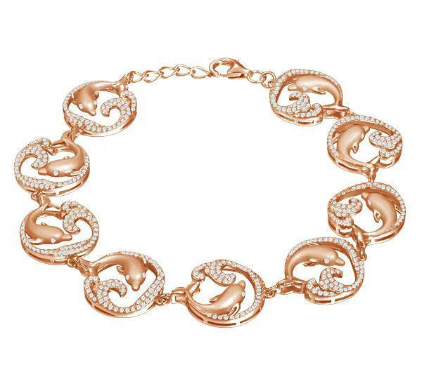 The picture shows a rose gold dolphin bracelet with topaz.