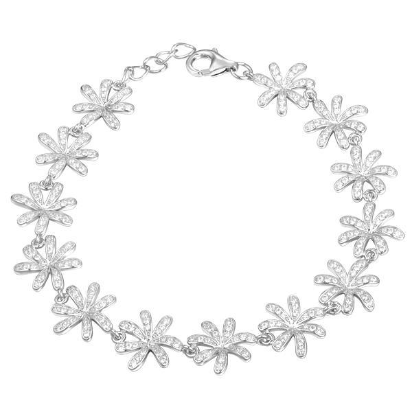 In this photo there is a white gold tiare gardenia bracelet with topaz gemstones. 