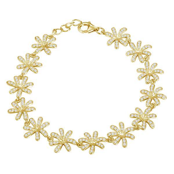 In this photo there is a yellow gold tiare gardenia bracelet with topaz gemstones. 