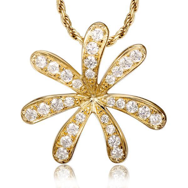In this photo there is a yellow gold tiare gardenia pendant with topaz gemstones.