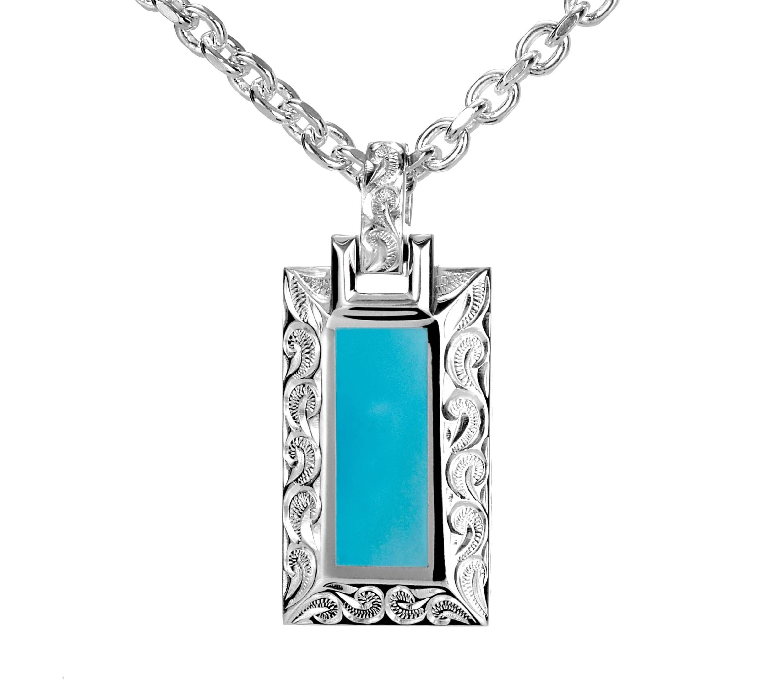 The photo shows a 925 sterling silver bar pendant with hand-engraved detailing and one large turquoise gemstone.
